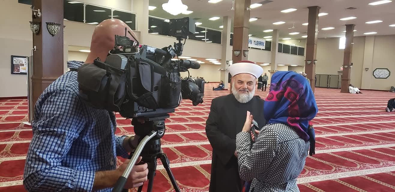 Media interview inside a mosque
